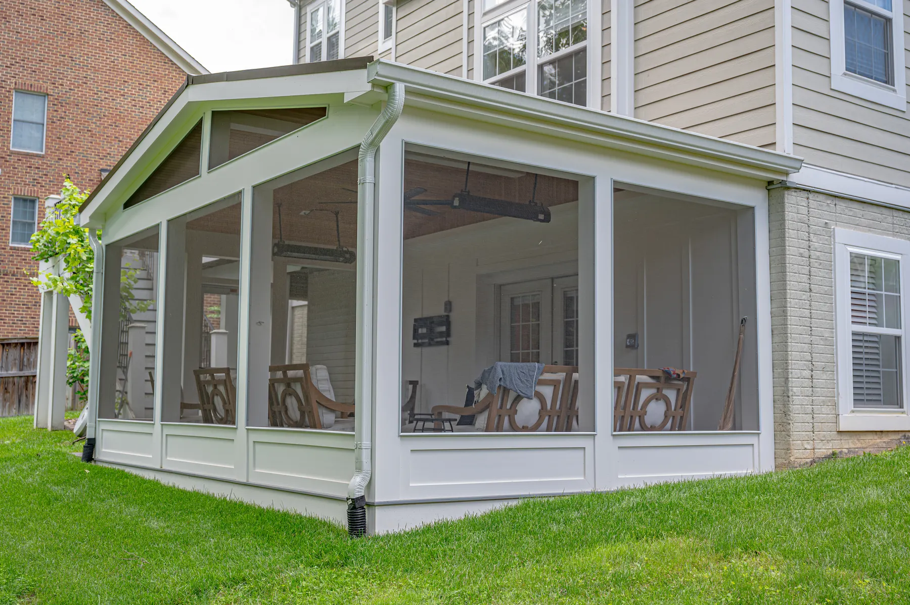 Corner view showing the front and side of the screened porch